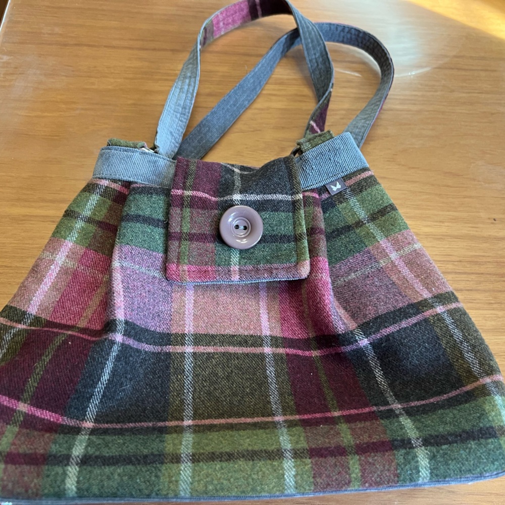 Elegant Plaid Purse with button detail. Made of wool with corduroy trim.